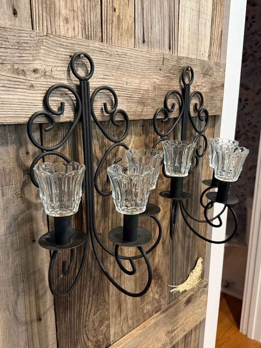 Pair of Vintage Black Scroll Metal Wall Sconces with Clear Glass Shades